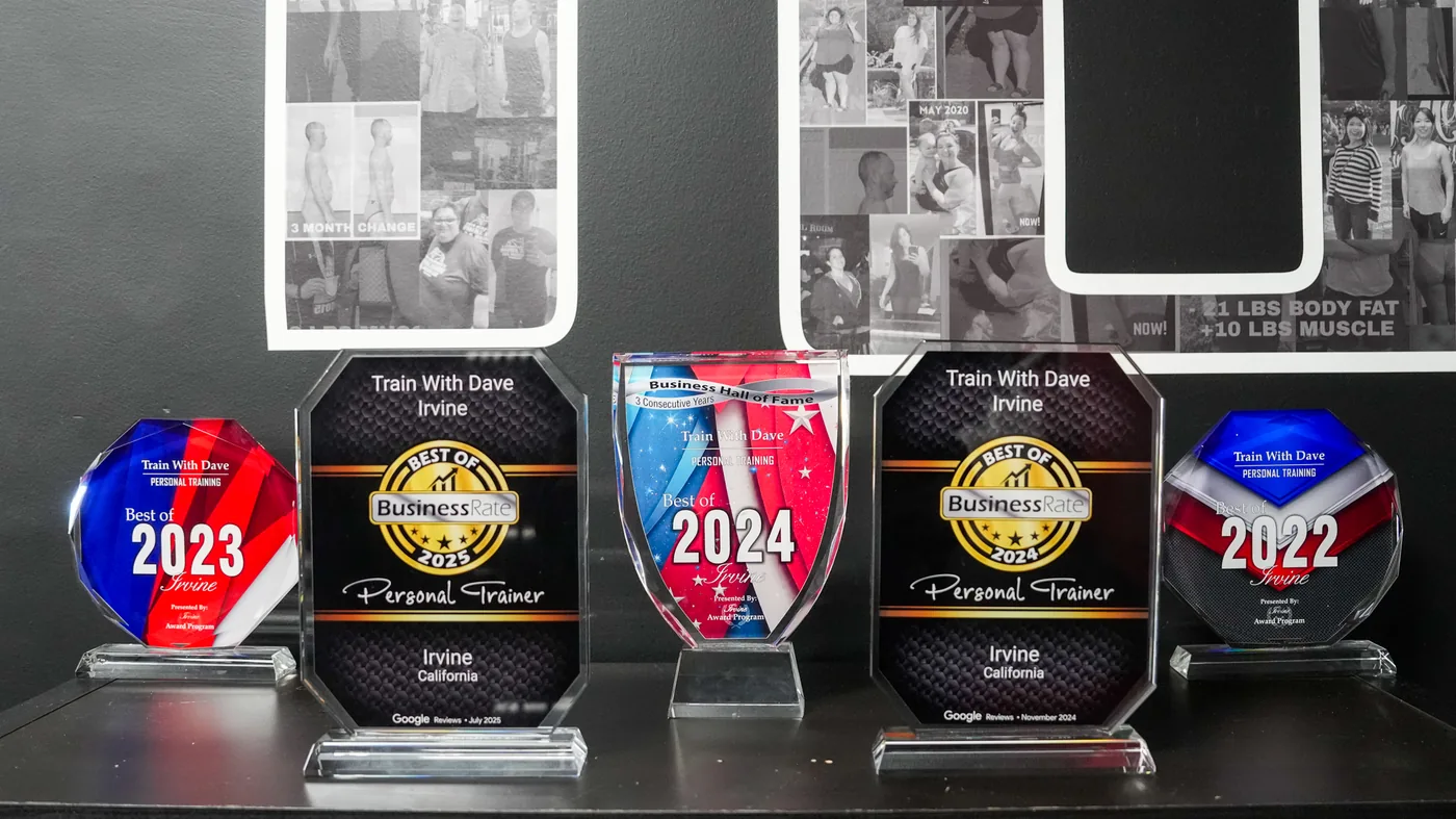 Train With Dave Irvine award plaques 2022–2026 and Irvine Business Hall of Fame