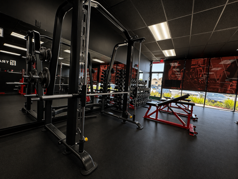 Full dumbbell rack at Train With Dave Orange personal training gym