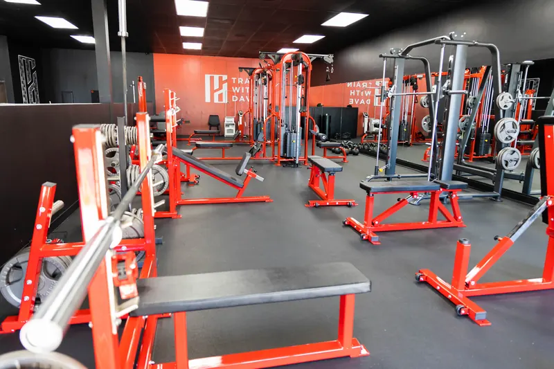 Orange studio training floor and racks