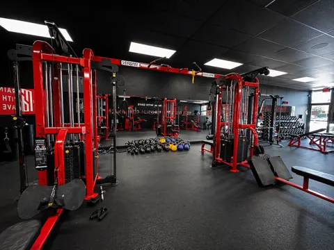 Orange studio kettlebell wall